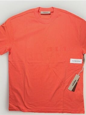 ESSENTIALS Coral Orange Short Sleeve Crewneck T-Shirt and shorts outfit